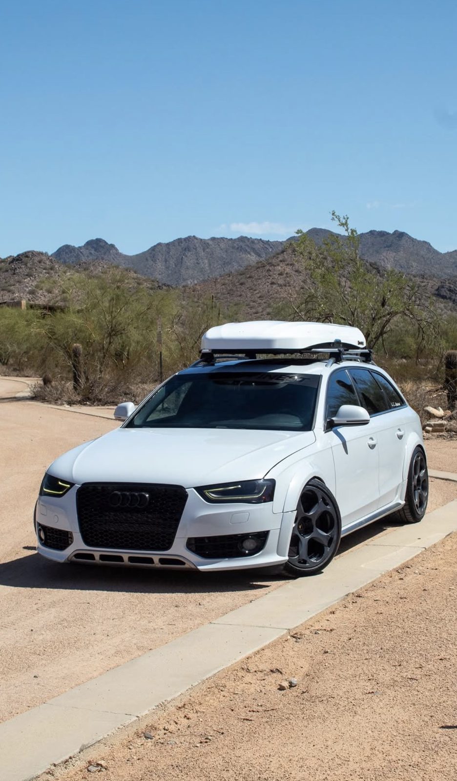 Detailed white Audi allroad protected from the Arizona sun